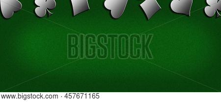 Different Card Suits, On A Green Background. Copy Space. Place For Text. Gambling Concept. Gambling 