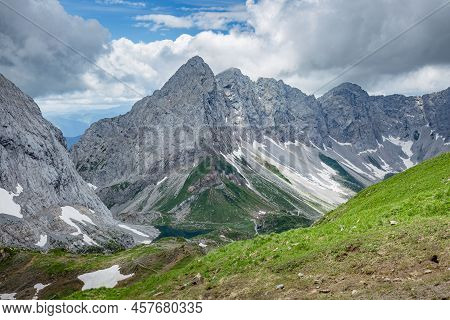 Mountain Hiking Trail Road. Grey Sky Before Thunderstorm. Between Italy And Austria: Near Volaia Lak