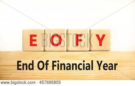 Eofy End Of Financial Year Symbol. Concept Words Eofy End Of Financial Year On Wooden Blocks On Beau