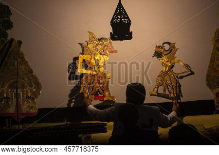 Wayang Kulit Or Shadow Puppets From Java, Indonesia Puppet Show By Dalang Or Puppeteer . Wayang Made