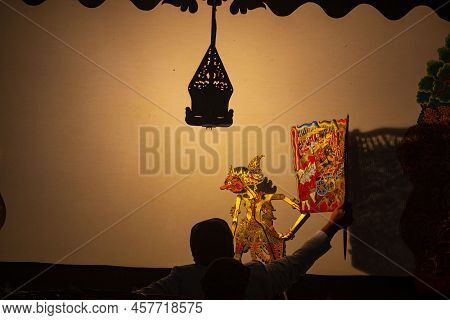 Wayang Kulit Or Shadow Puppets From Java, Indonesia Puppet Show By Dalang Or Puppeteer . Wayang Made