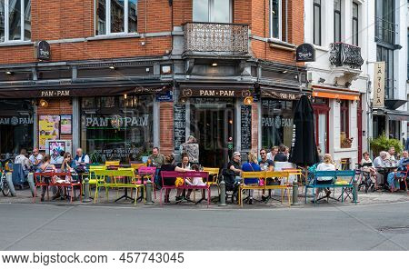 Ixelles, Brussels Capital Region, Belgium - 07 03 2022 - People Sitting On The Terraces Of The Pam P