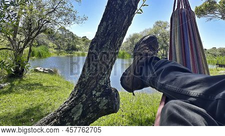 Person Resting At Countryside Landscape