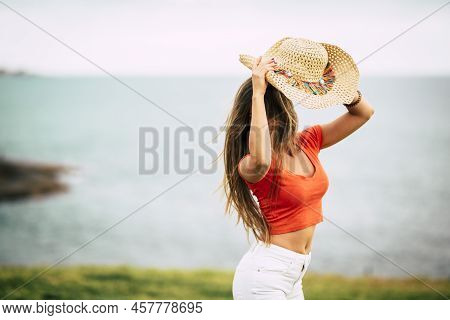 Youthful People In Outdoor Funny Leisure Activity Alone. Young Woman Enjoying And Celebrating Alone 