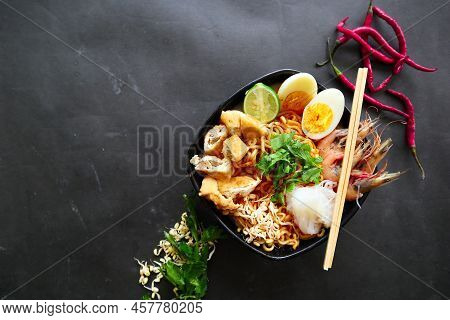 Laksa, Laksa Curry Made From Vermicelli, Noodles, Bean Sprouts, Egg, Tofu Lime, And Shrimp With A Sp
