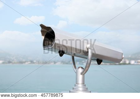 Metal Tower Viewer Installed Near Sea. Mounted Binoculars