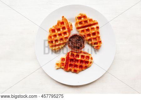 Croissant Waffle Or Croffle With Chocolate Sauce Served In Box And White Background