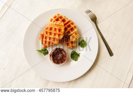 Croissant Waffle Or Croffle With Chocolate Sauce Served In Box And White Background