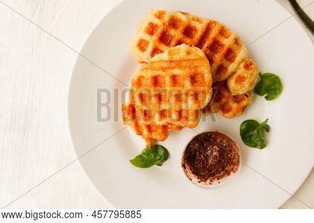 Croissant Waffle Or Croffle With Chocolate Sauce Served In Box And White Background
