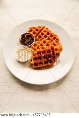 Croissant Waffle Or Croffle With Chocolate Sauce Served In Box And White Background