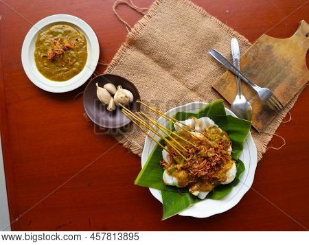 Sate Padang Or Satay Padang Is Spicy Beef Satay From Padang, West Sumatra. Served With Spicy Curry S