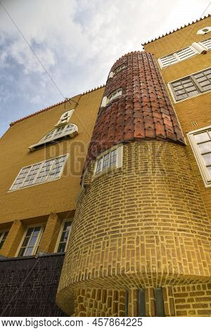 Amsterdam, Netherlands. June 2022. View Of Characteristic Brick Residential Building In The Style Of