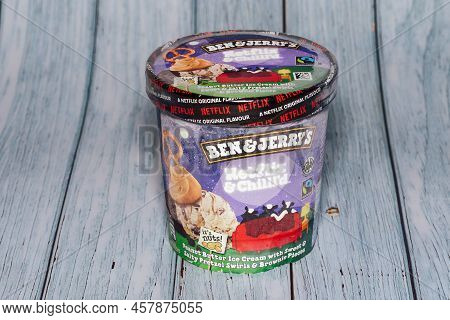 Ben And Jerry Netflix And Chill Original Flavour Ice Cream. Famous Brand Frozen Dessert On Cardboard