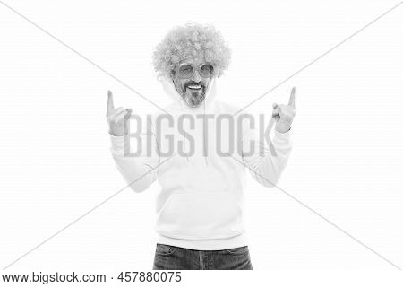 Funky Party. Bearded Man Wear Funky Wig. Nerdy Look. Showing Sign Of Horns. Heavy Metal Culture
