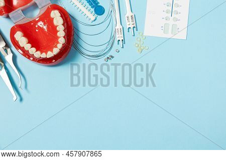 A Set Of Special Tools For An Orthodontist To Install Braces For A Patient. Orthodontic Arcs, Ligatu