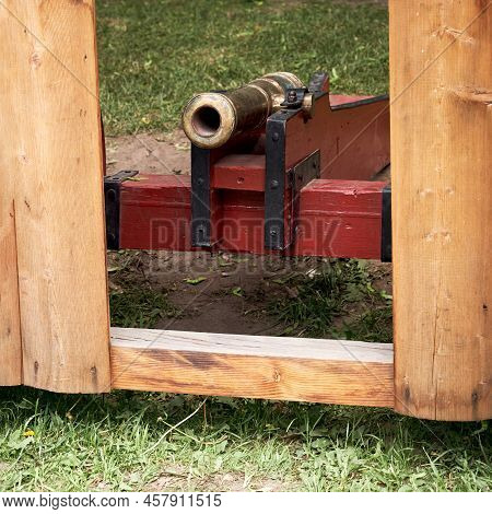 Vintage Swedish Cannons And Metal Cannonballs. Ancient Military Arsenal Of The Events Of The Russian