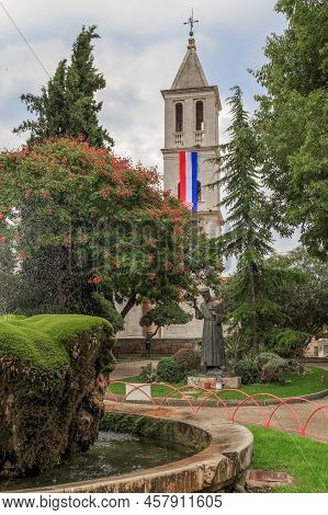 Sibenik, Croatia - September 9, 2016: This Is Luje Maruna Park With A Fountain, A Monument To St. Fr