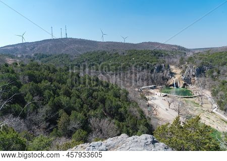 Wide View Of Wind Turbines And Turner Falls On Honey Creek In The Arbuckle Mountains Of South-centra