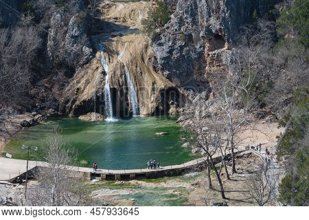 Close-up Turner Falls With People Visiting On Honey Creek In The Arbuckle Mountains Of South-central