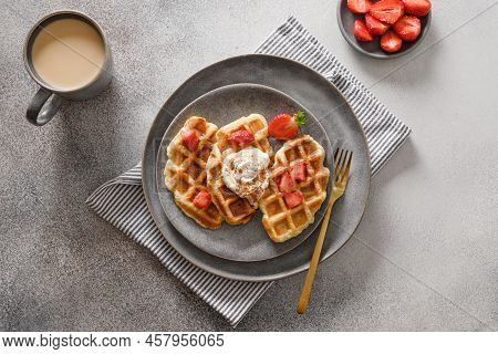 Trendy Breakfast With Croffles And Morning Coffee, Strawberries. Croissant As Waffle.