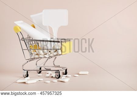 Titanium Dioxide, E171, Dangerous Additive Concept. Gum, Pills, Toothpaste, Cream In Basket And Sign