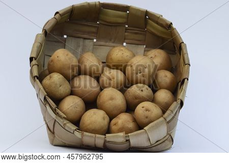 Potatoes In Basket. Baby Potatoes Small Round Potato From India On White Background Asian Vegetables