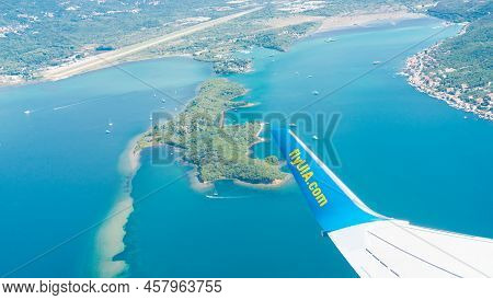 Montenegro, Budva - September 6, 2021: View Of The Wing Of The Ukrainian Uia Aircraft Flying Over Se