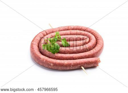 Raw Thin  Lamb Sausages Isolated On White Background