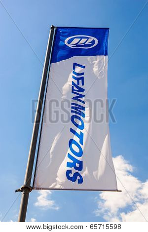 Samara, Russia - May 25, 2014: The Flag Of Lifan Motors Over Blue Sky. Lifan Group Is A Privately Ow