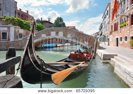 Gondola on a beautiful canal in Venice, Italy