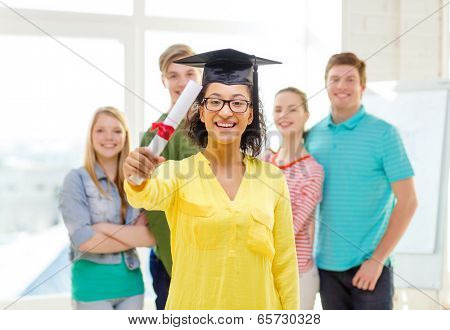 education and people concept - smiling female student with diploma and corner-cap and friends on the back