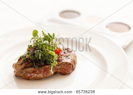 grilled steak with herbs