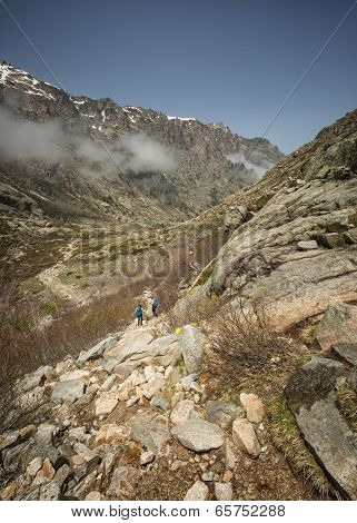 Hikers In The Mountains Of Restonica In Corsica