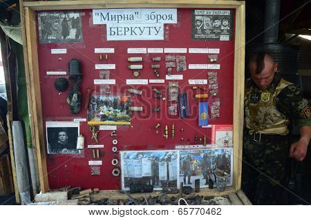 KIEV, UKRAINE - APR 24, 2014: Downtown of Kiev.Camp decoration with military items.Rioters camp.Putsch of Junta.April 24, 2014 Kiev, Ukraine 
