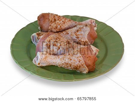 Raw Chicken Legs On Green Plate Isolated