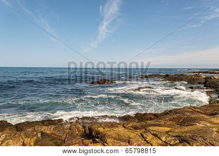 Ocean Waves Crashing Against Shore