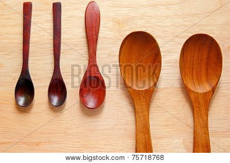 Collection Of Wooden Kitchen Spoons On Wood Background