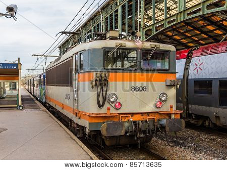 Narbonne, France - January 06: Regional Train Hauled By Electric Locomotive At Narbonne Station On J