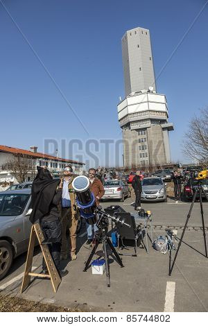 People Watch The Partial Eclipse At The Feldberg