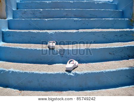 Flip-flops Walking Up The Stairs.