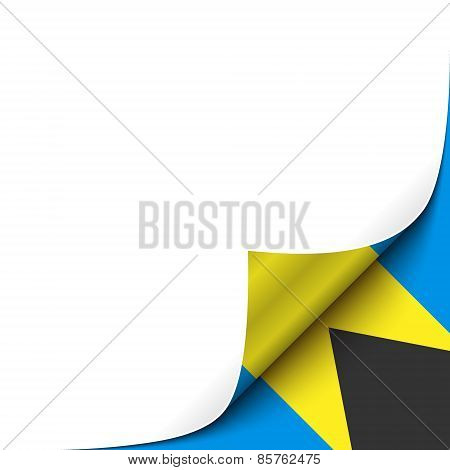 Curled up Paper Corner on Bahamian Flag Background. Vector Illustration