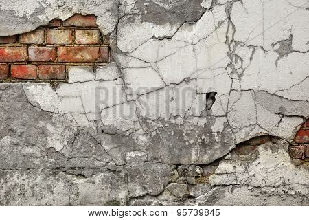 Broken Old Bricklaying From Red White Bricks And Damaged Plaster