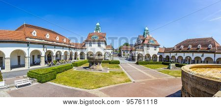 People Enjoy The Sun In The Beautiful Sprudelhof