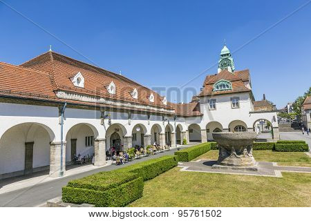 People Enjoy The Sun In The Beautiful Sprudelhof In Bad Nauheim