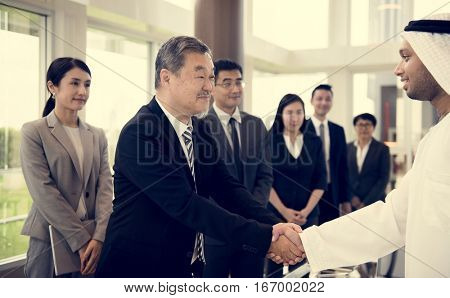 Business Partners Introductionary Handshake Bow