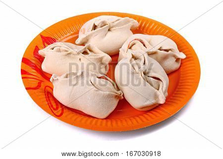 Frozen Manti Laying On The Orange Plate