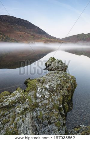 Beautiful Autumn Fall Landscape Image Of Crummock Water At Sunrise In Lake District England