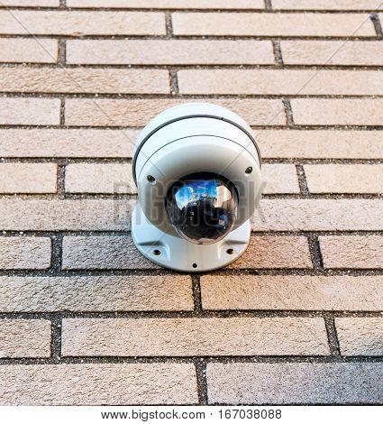 A sucurity camera on a building can see everything