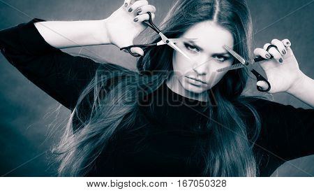 Female Hairstylist Barber With Scissors.