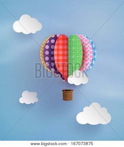 Origami made colorful hot air balloon and cloud.paper art style.